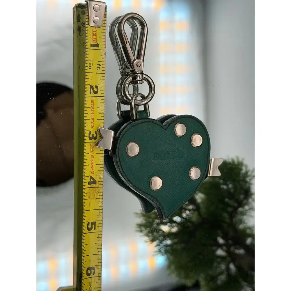 Prada studded heart keychain made of green saffiano leather